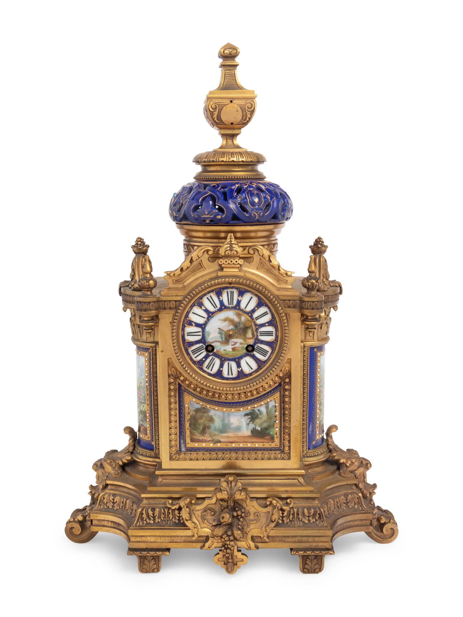 A French Porcelain Mounted Gilt Bronze Clock