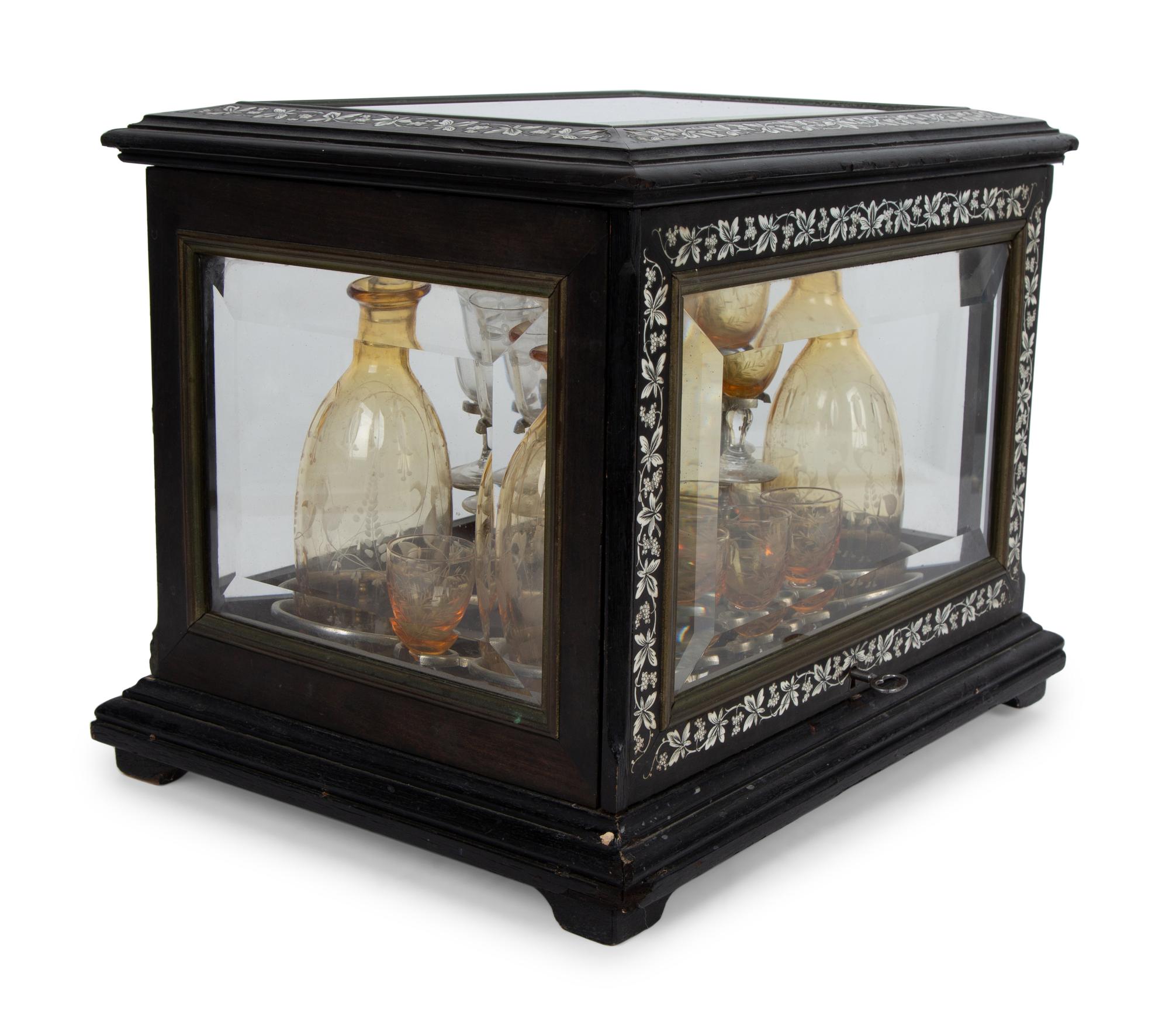 A French Ebonized and Inlaid Cave à Liqueur with Amber Glass Decanters — LATE 19TH CENTURY
