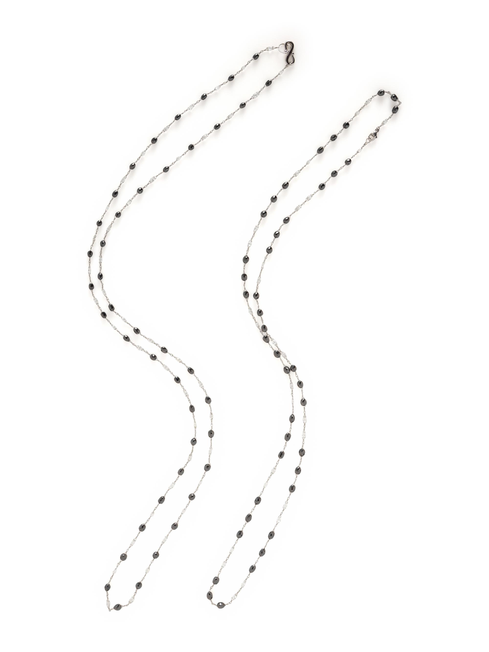 COLLECTION OF DIAMOND AND BLACK DIAMOND NECKLACES