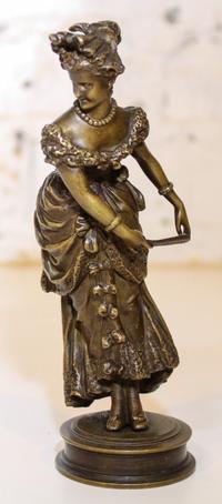 A Victorian Bronze Figure. Height 6 1/4 inches.
