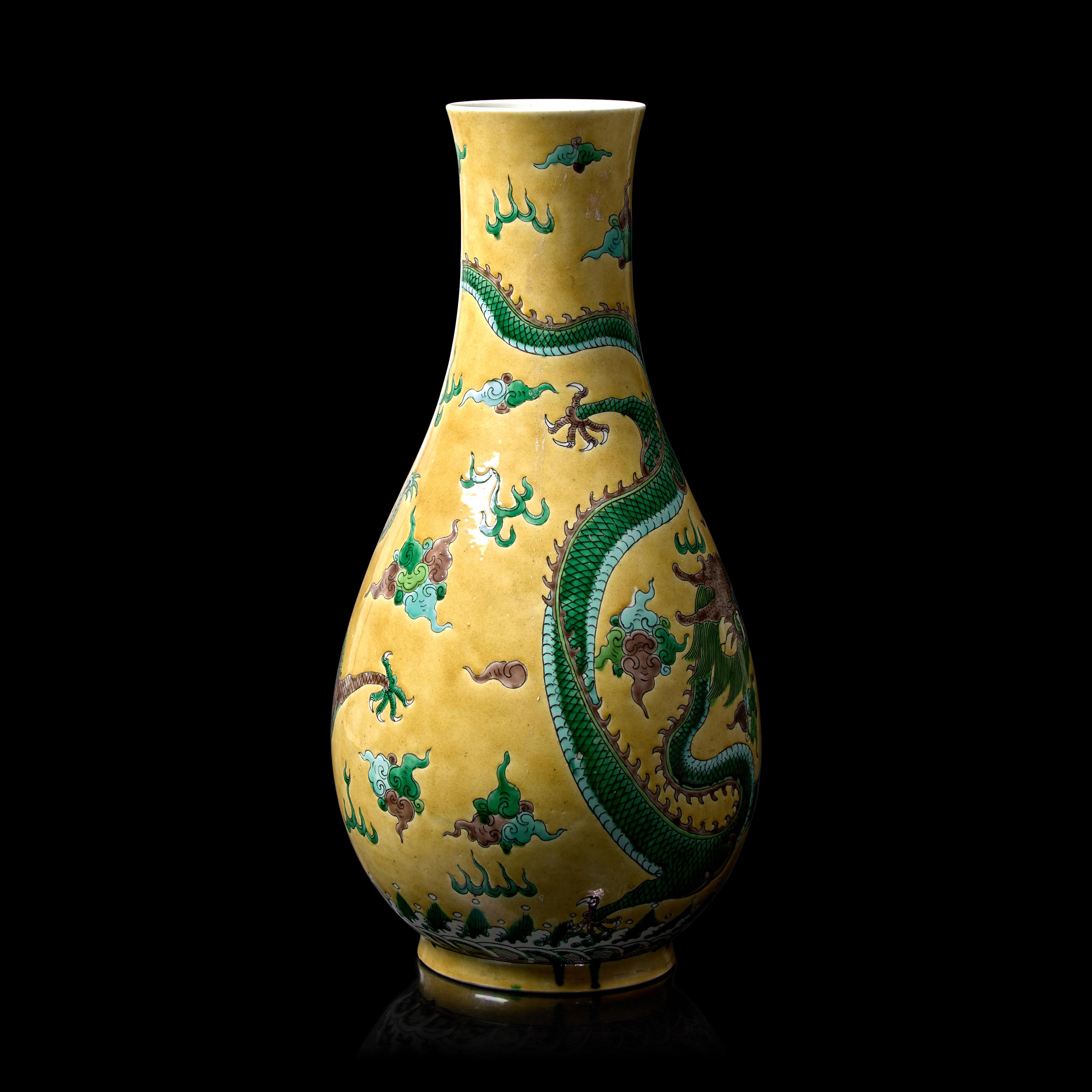 A Chinese Yellow Ground Famille Verte 'Dragons' Vase, Late Qing to Republic Period 晚清-民國 黃地素三彩龍紋瓶