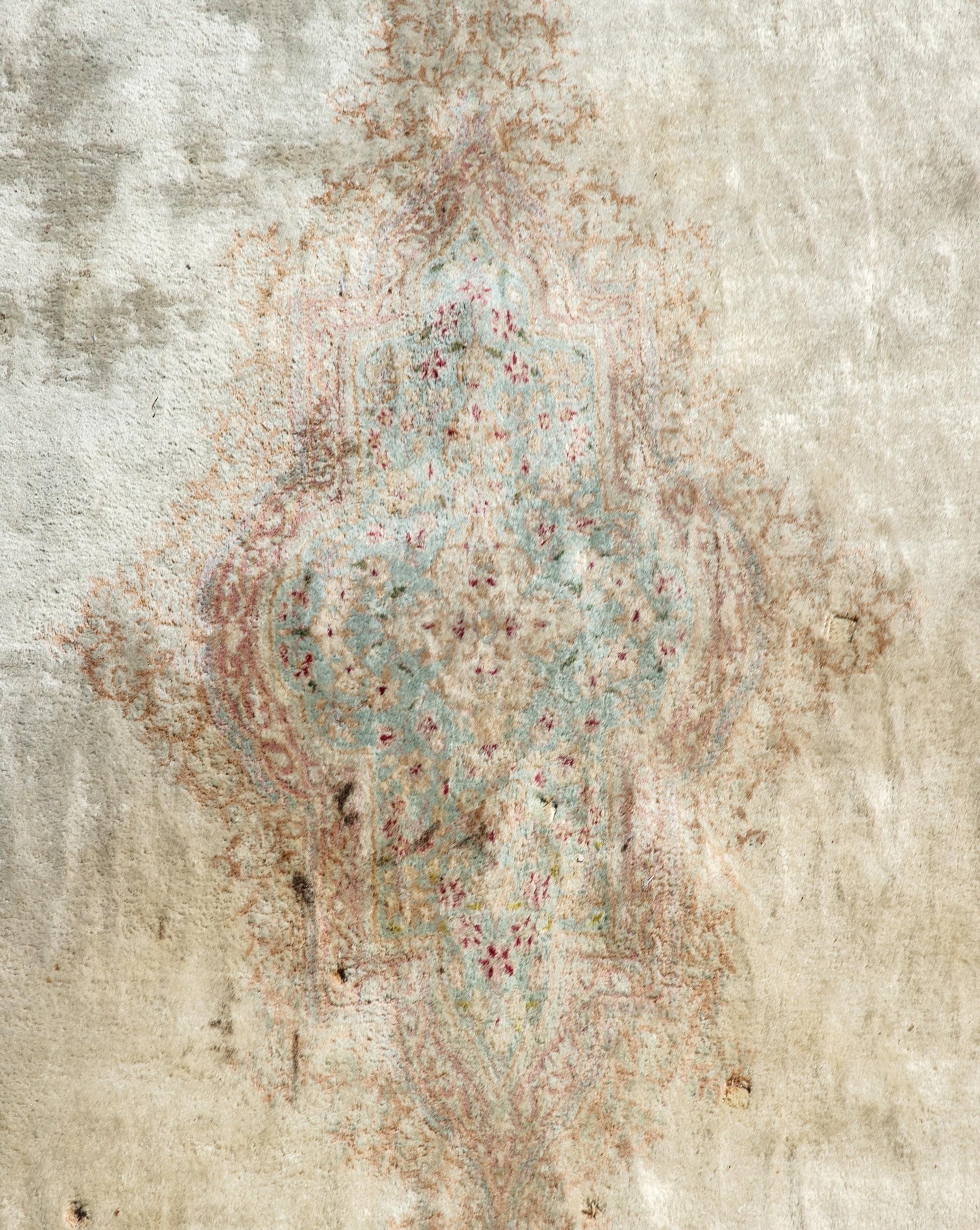 A Kerman Wool Rug — 20TH CENTURY