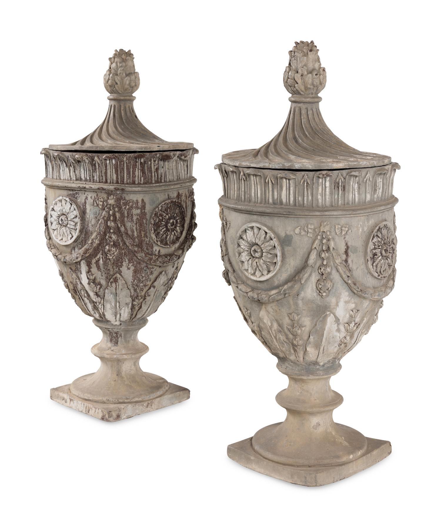 A Pair of Lead Garden Urns and Covers