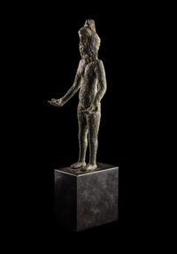 An Etruscan Bronze Female Figure Wearing a Theater Mask
