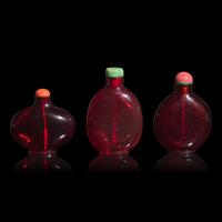 Three Chinese Ruby Glass Snuff Bottles