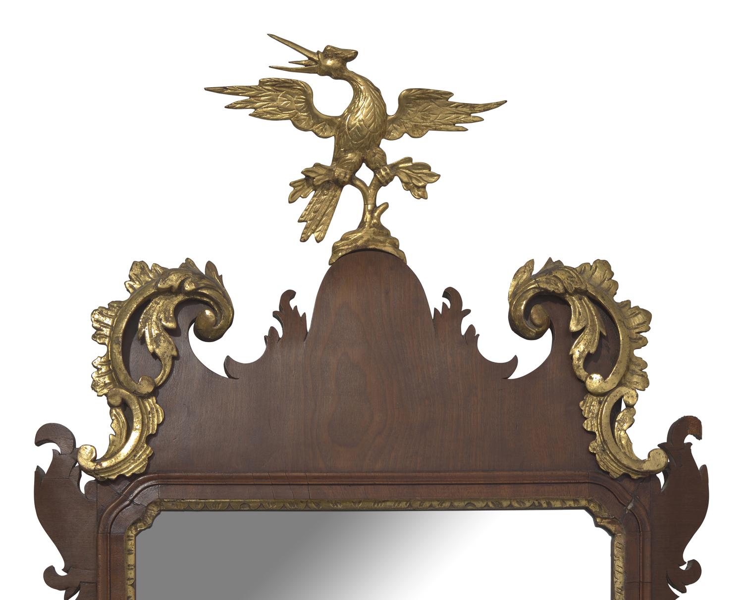 A Chippendale Mahogany and Parcel-Gilt Looking Glass, Circa 1770