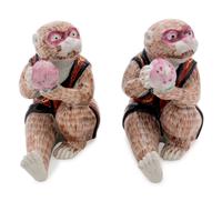 A Pair of Mottahedeh Porcelain Monkey Figures