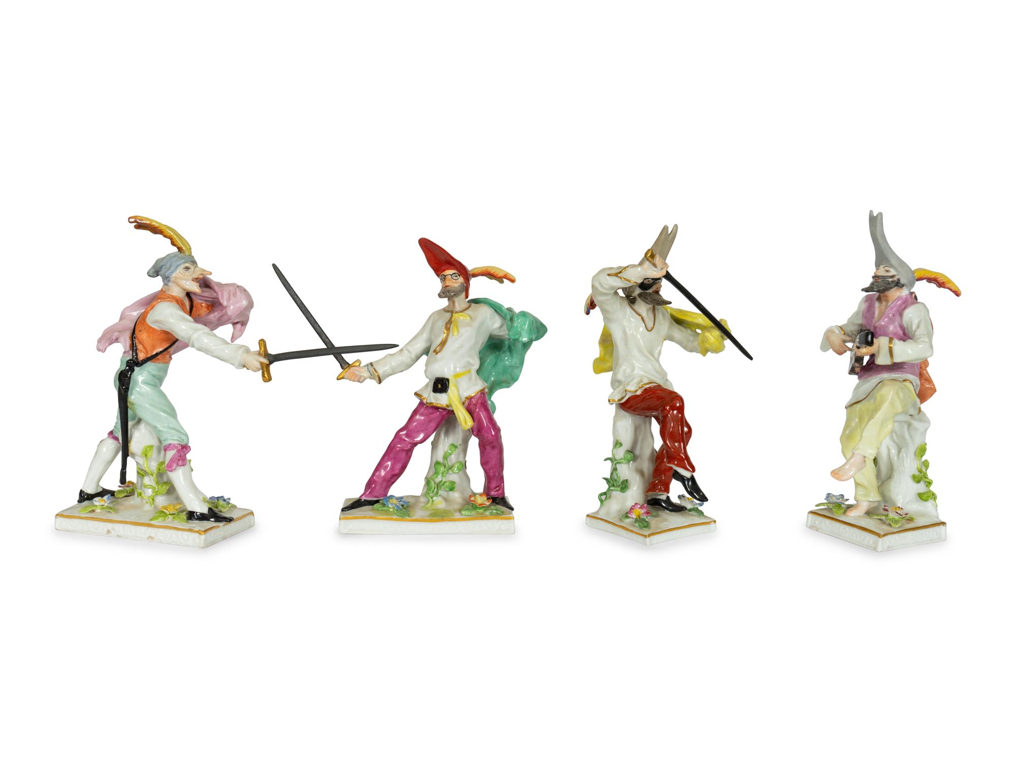 A Set of Four Continental Porcelain Commedia Dell'Arte Figures