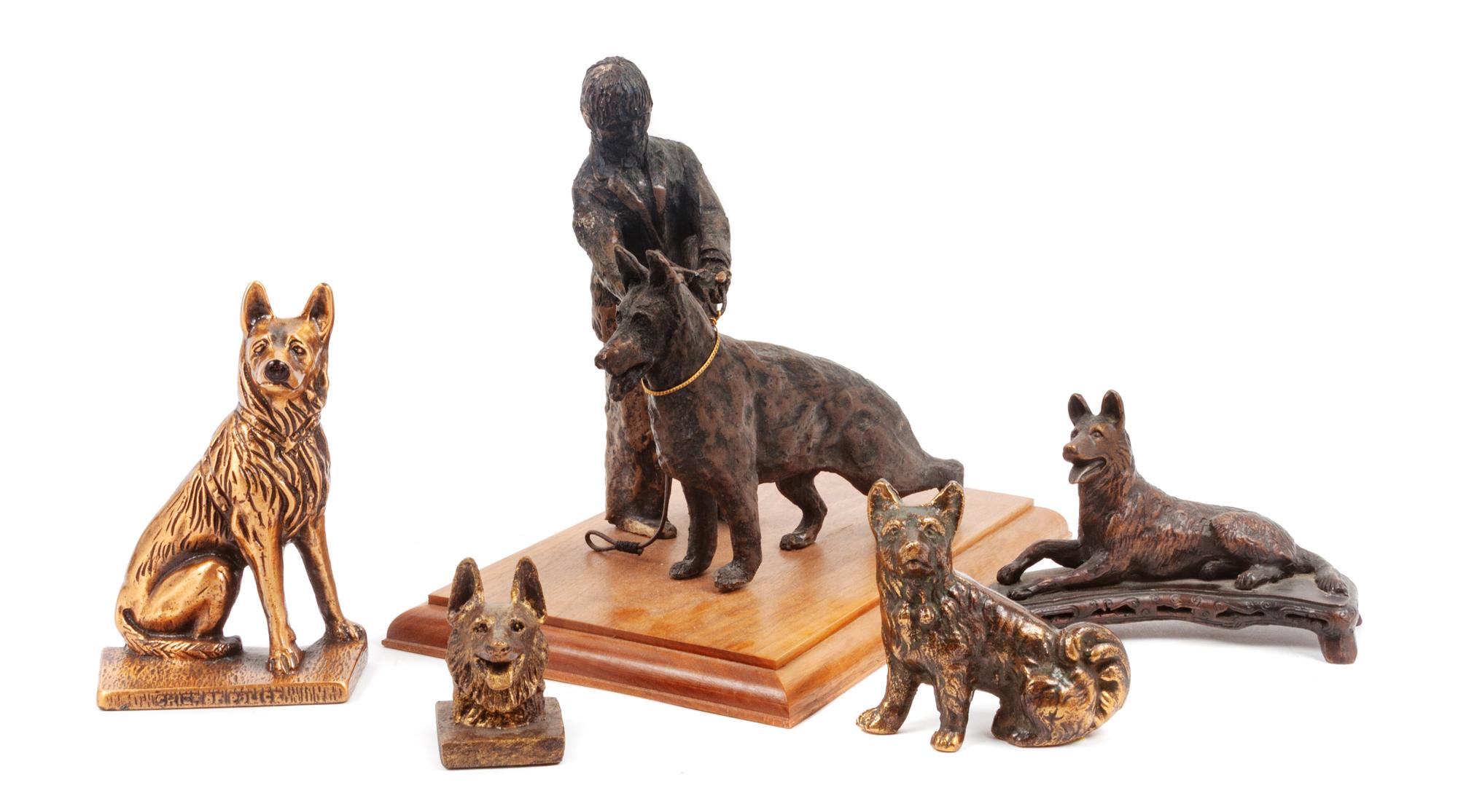 A Group of Five Bronze and Metal German Shepherds Height of tallest 10 inches.