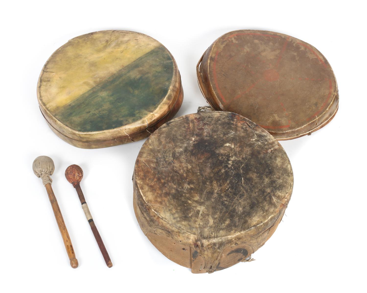 A Wood and Leather Drum and Drumstick Diameter 14 of first 1/4 inches.