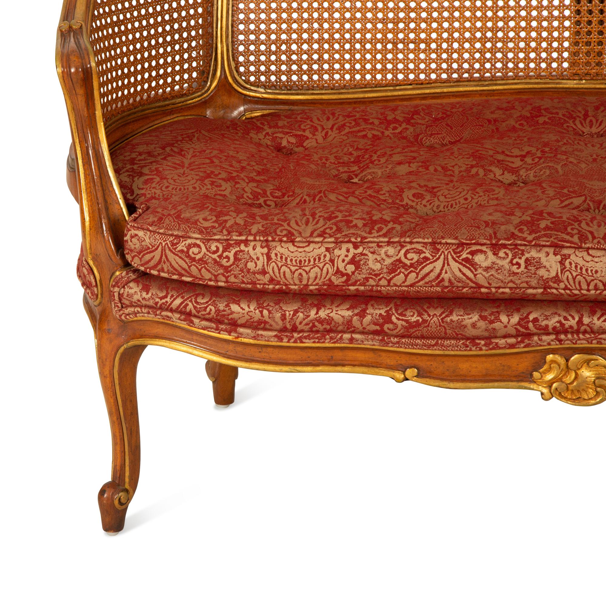 A Pair of Louis XV Style Stained and Giltwood Settees