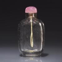 A Chinese "Hair Crystal" Snuff Bottle, Qing Dynasty, Circa 1740-1850 — 1740–1850年 髮晶素面鼻煙壺