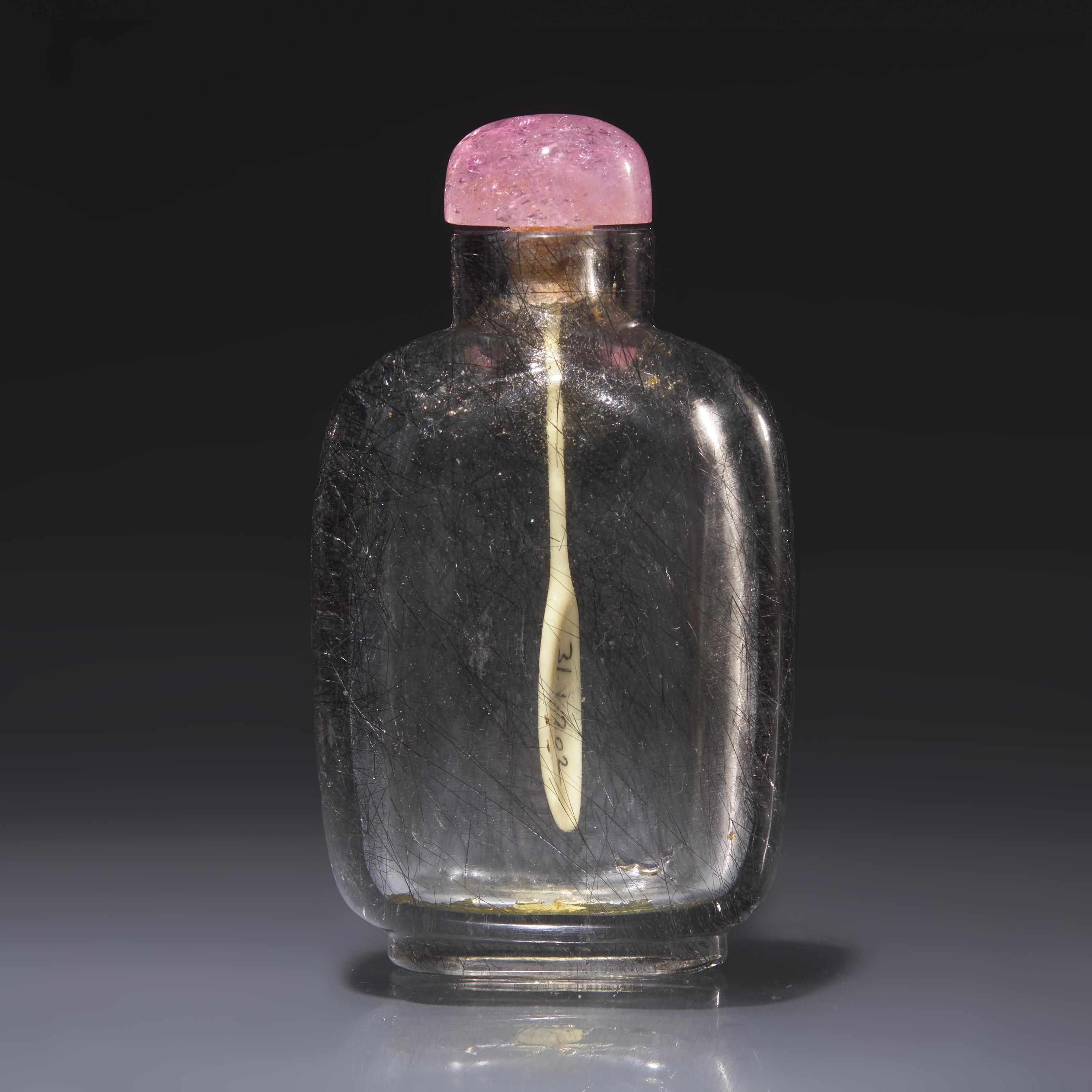 A Chinese "Hair Crystal" Snuff Bottle, Qing Dynasty, Circa 1740-1850 — 1740–1850年 髮晶素面鼻煙壺