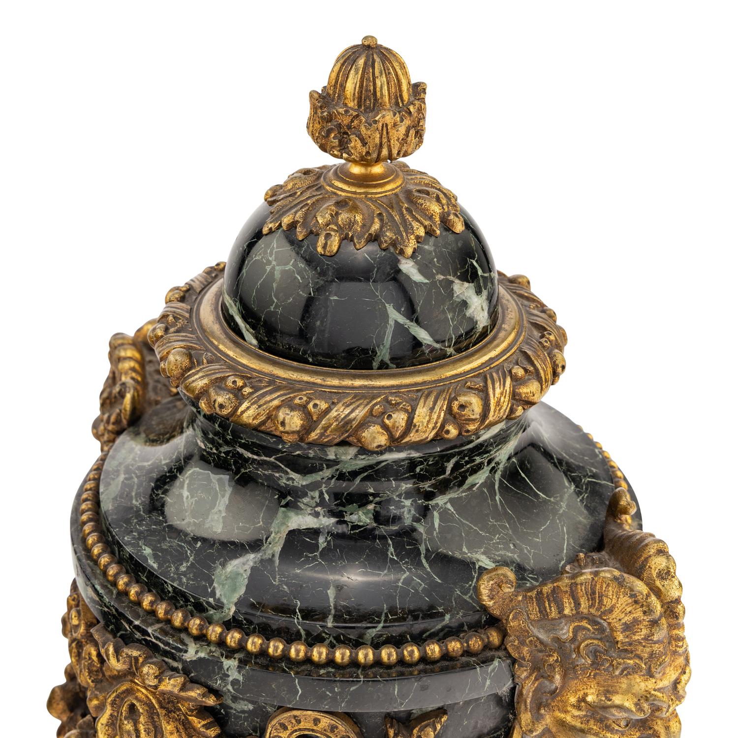 A Pair of French Gilt Bronze Mounted Verde Antico Marble Urns