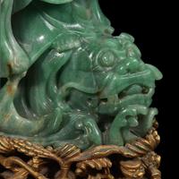 A Chinese carved green aventurine quartz Guanyin, mounted as a lamp 东陵石雕观音