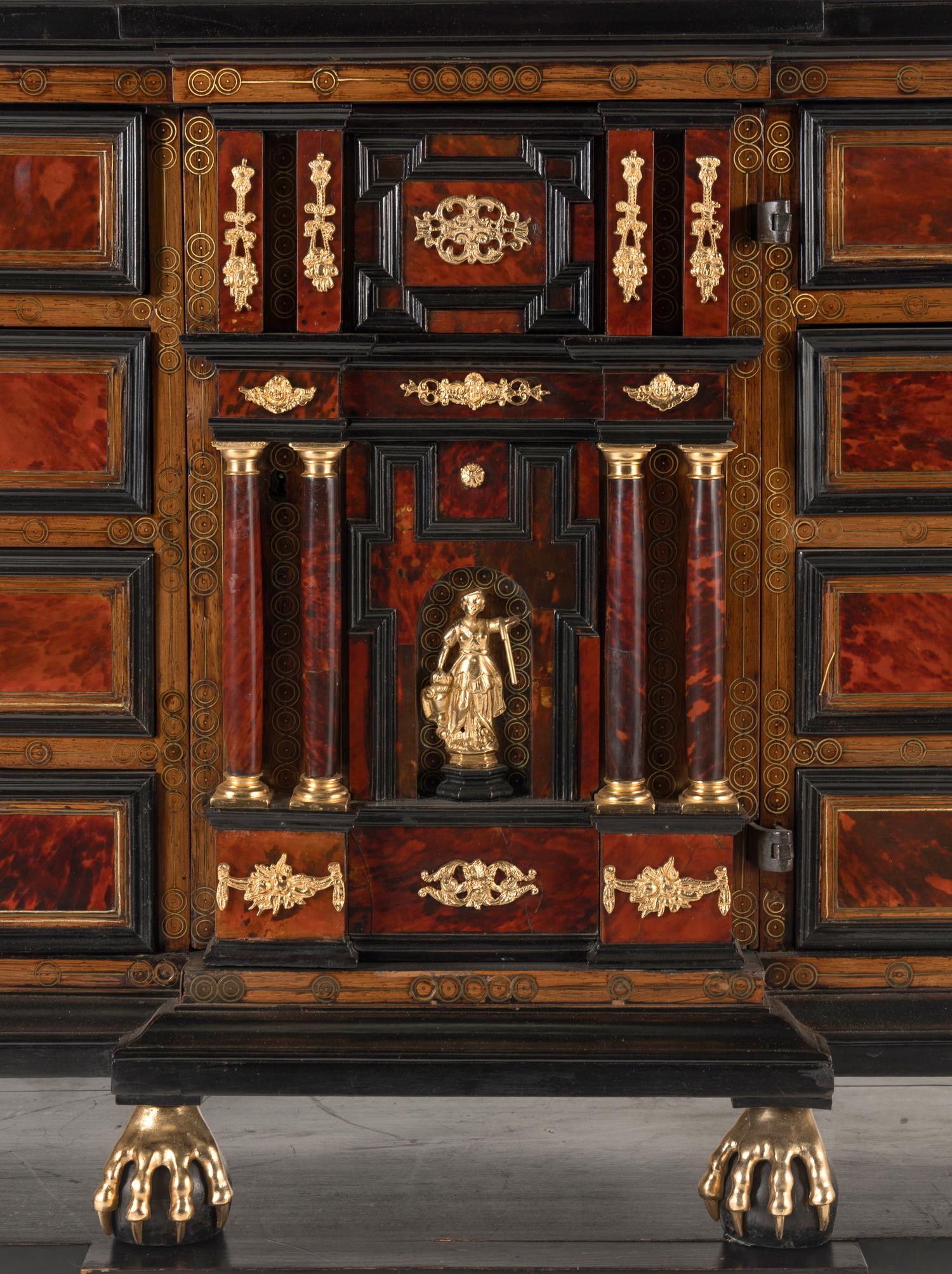A Flemish Baroque Part Ebonized Walnut Cabinet on Later Stand