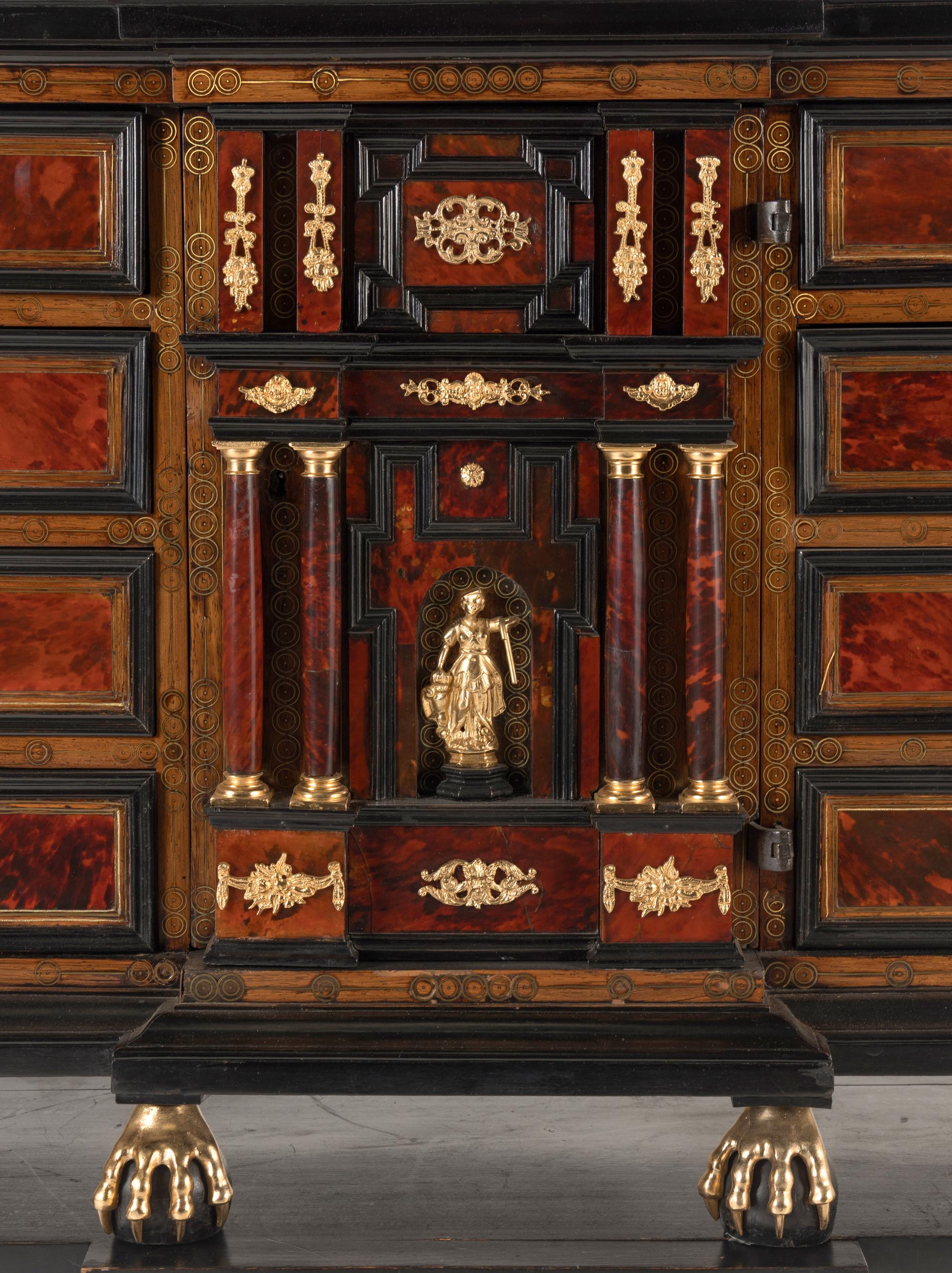 A Flemish Baroque Part Ebonized Walnut Cabinet on Later Stand