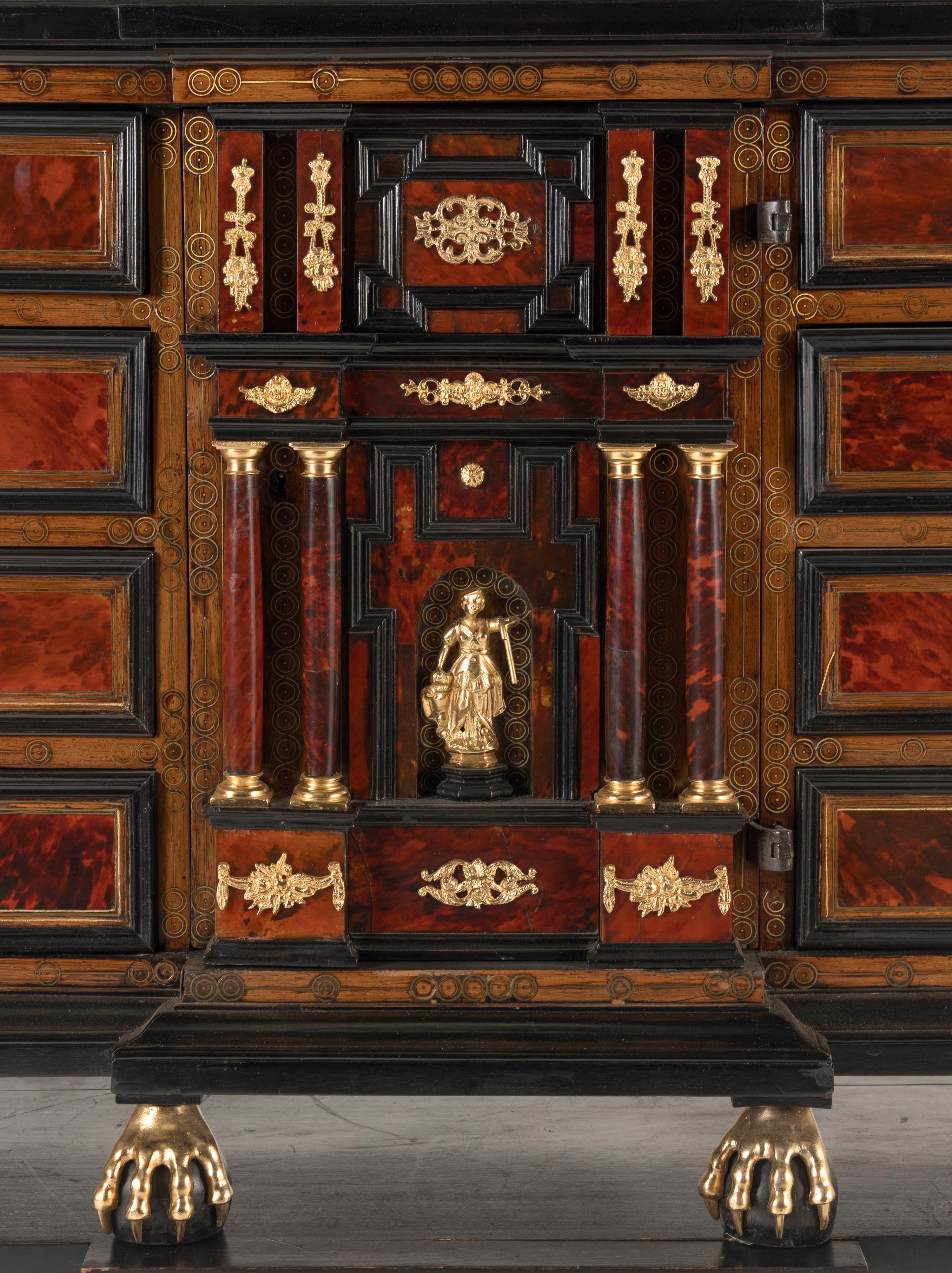 A Flemish Baroque Part Ebonized Walnut Cabinet on Later Stand