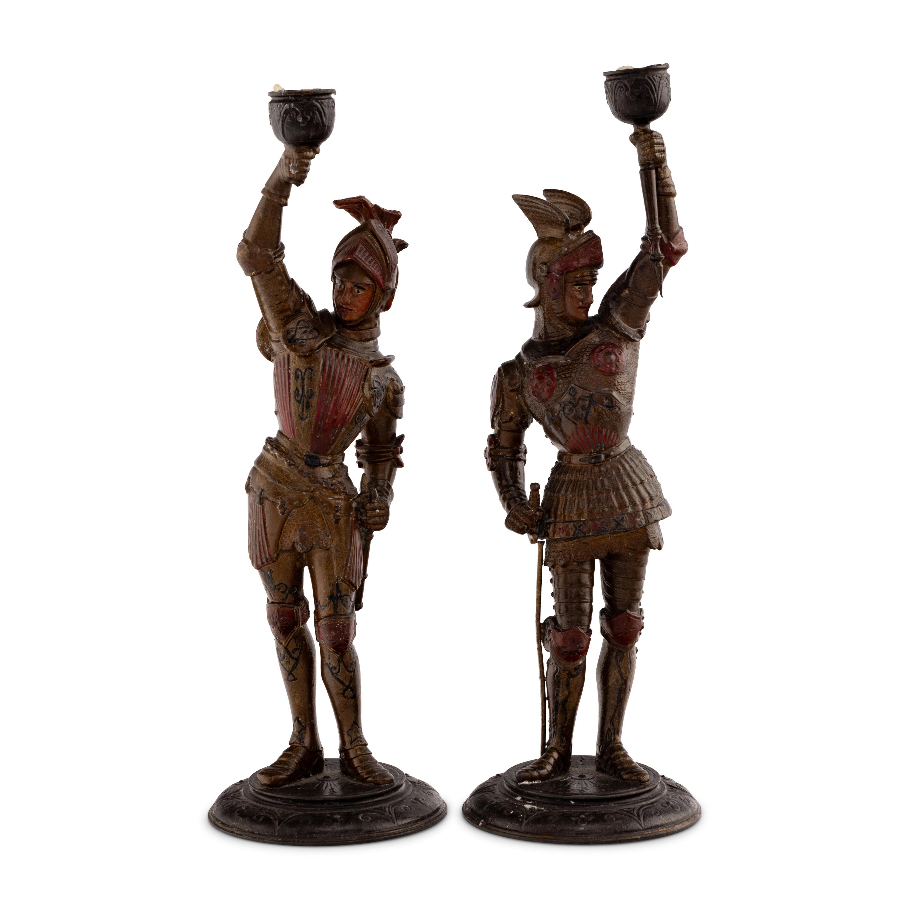 A Pair of Cold Painted Cast Metal Figural Candlesticks