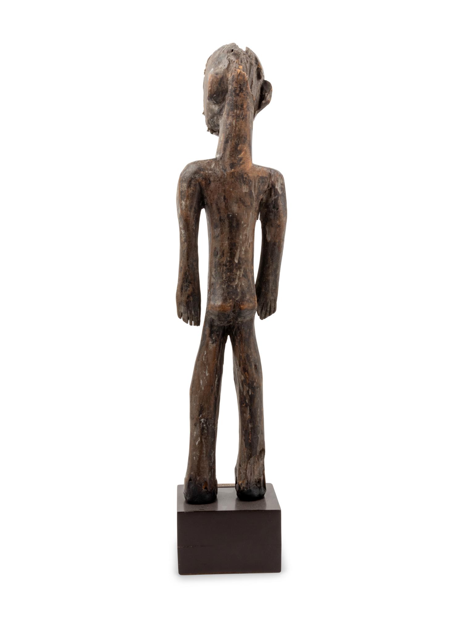A Bambara Carved Wood Figure