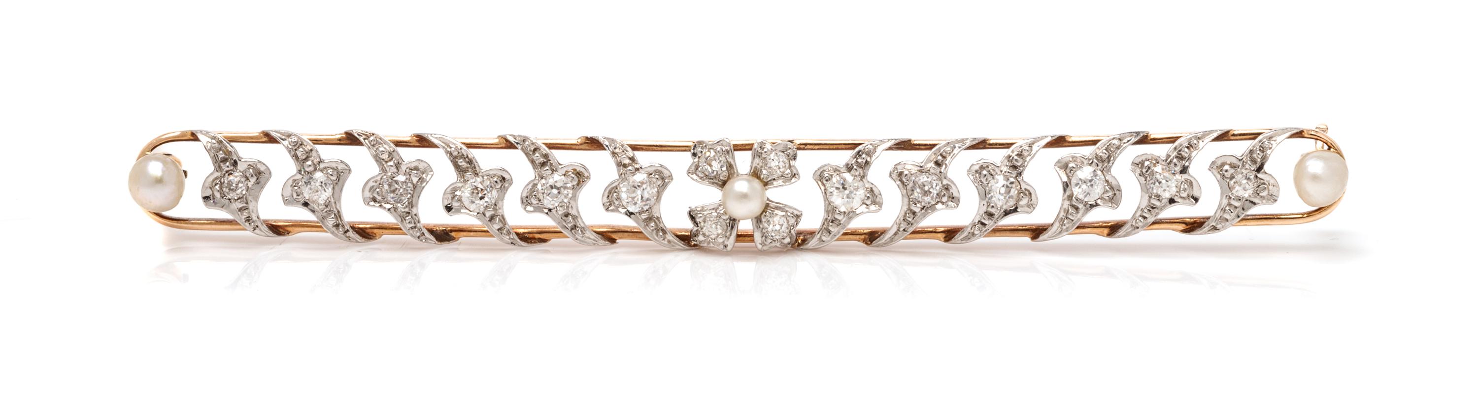 An Edwardian Platinum, Rose Gold, Diamond and Pearl Bar Brooch, 5.20 dwts.