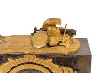 A Louis Philippe Gilt Bronze and Steel Figural Mantel Clock