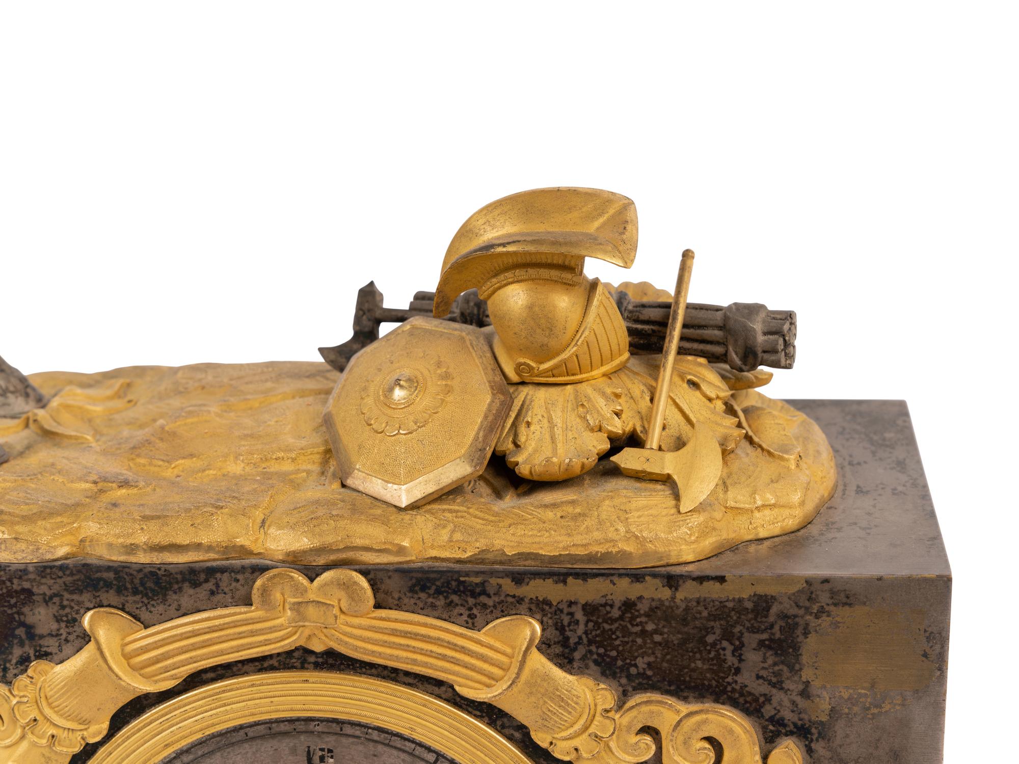 A Louis Philippe Gilt Bronze and Steel Figural Mantel Clock