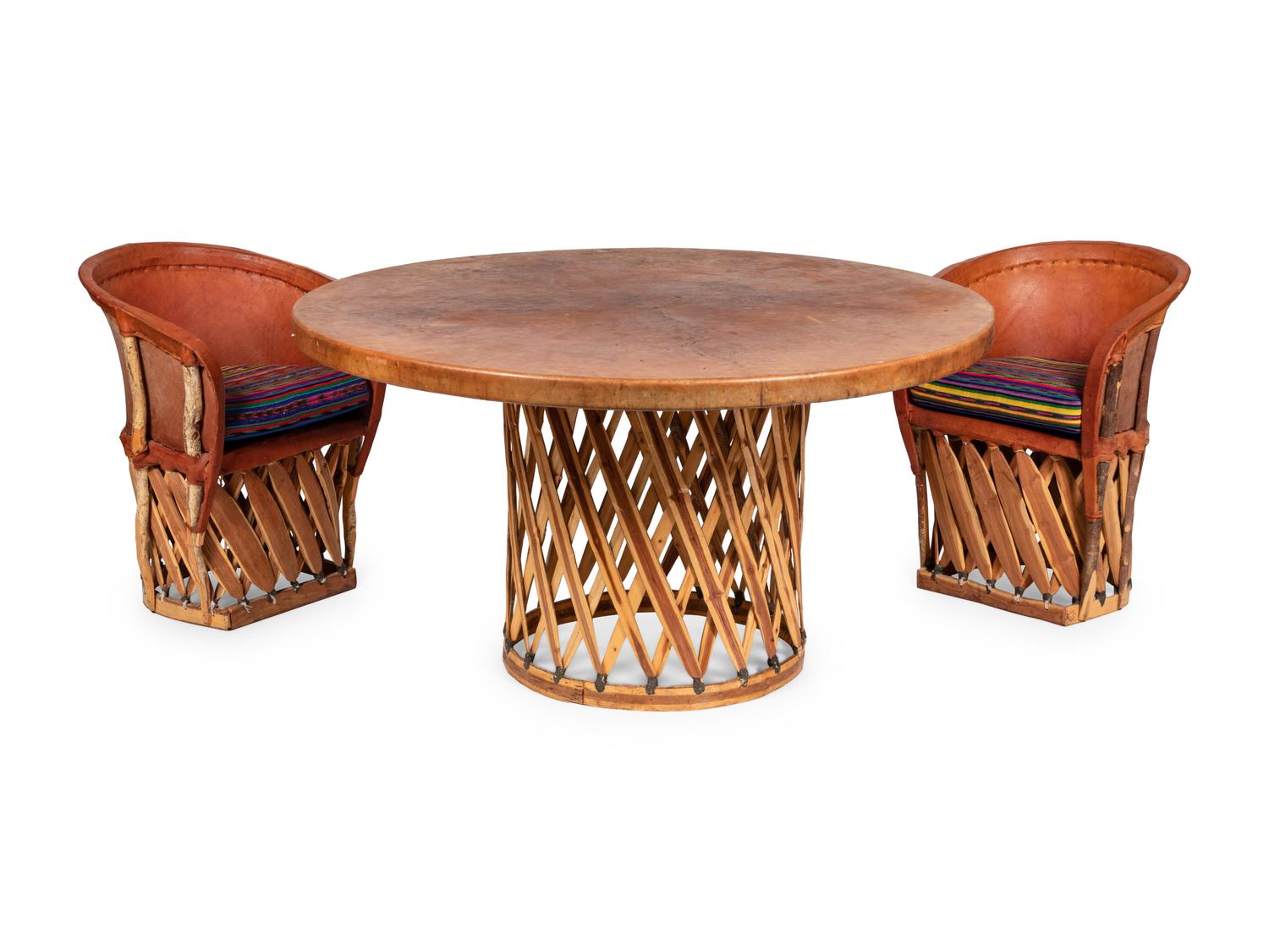 A Mexican Equipale Dining Table and Chairs