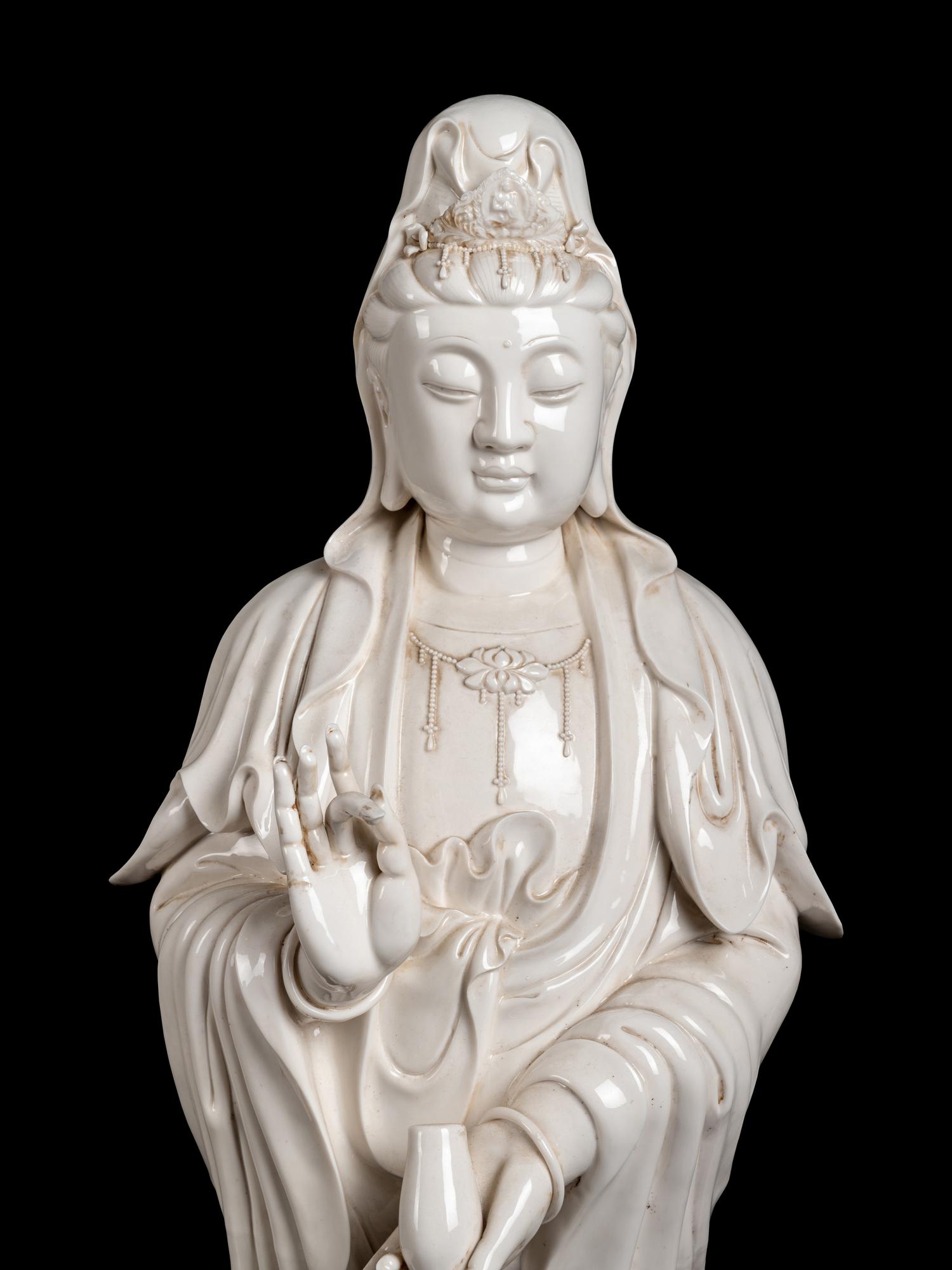 A Monumental Chinese Blanc-de-Chine Porcelain Guanyin Figural Group