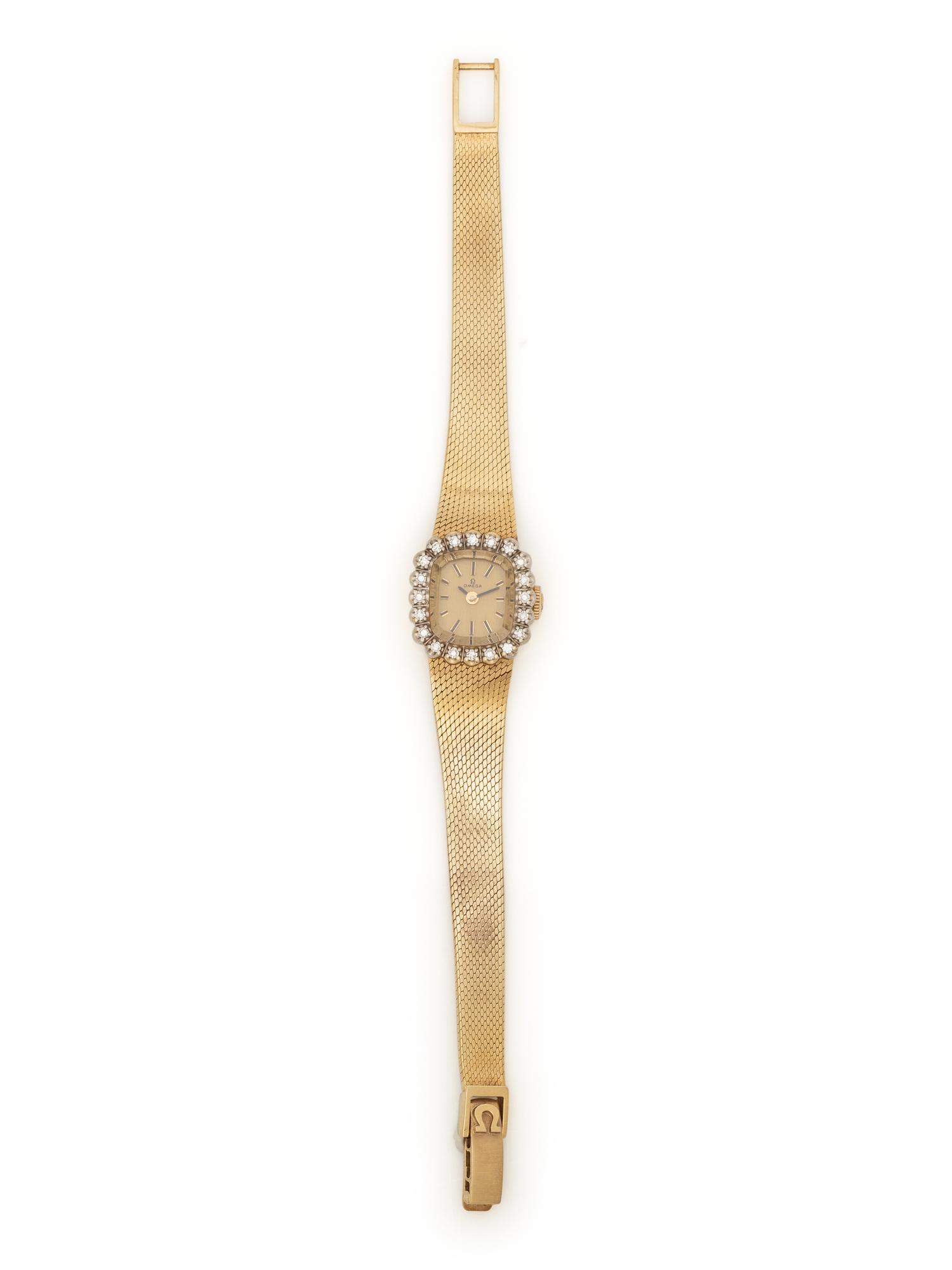 OMEGA, 14 KARAT YELLOW GOLD AND DIAMOND WATCH