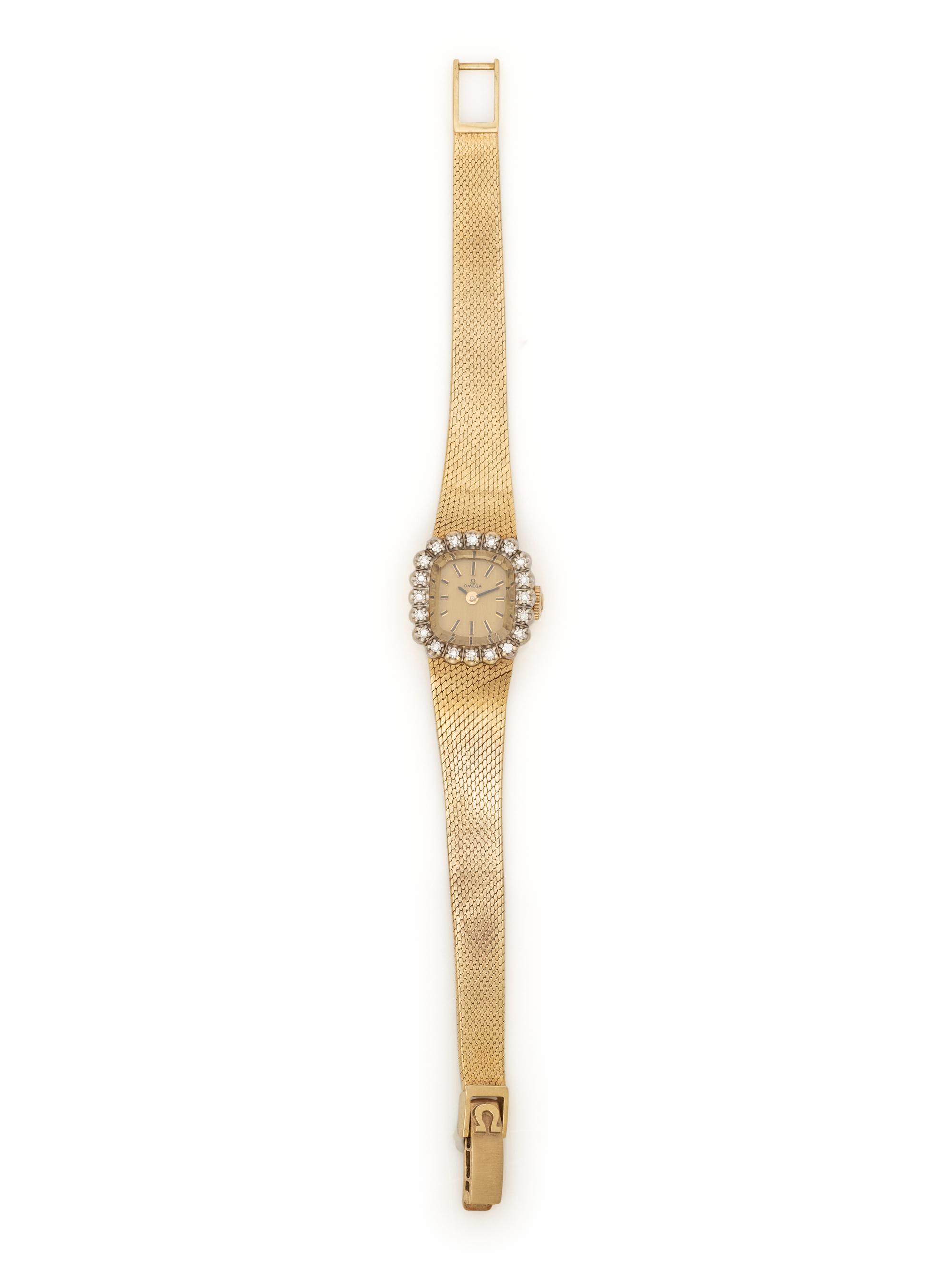 OMEGA, 14 KARAT YELLOW GOLD AND DIAMOND WATCH