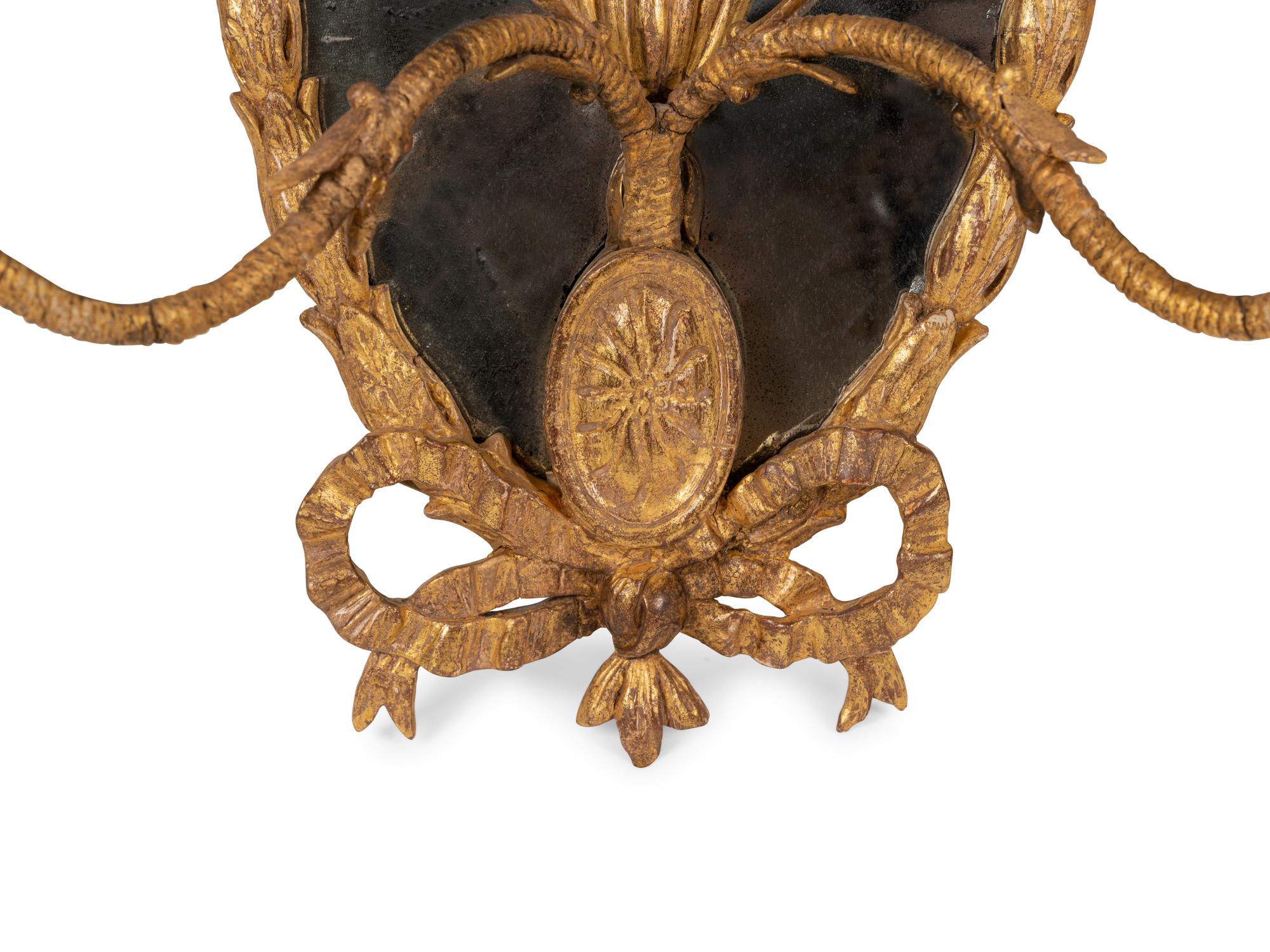 A Pair of George III Giltwood Girandole Mirrors