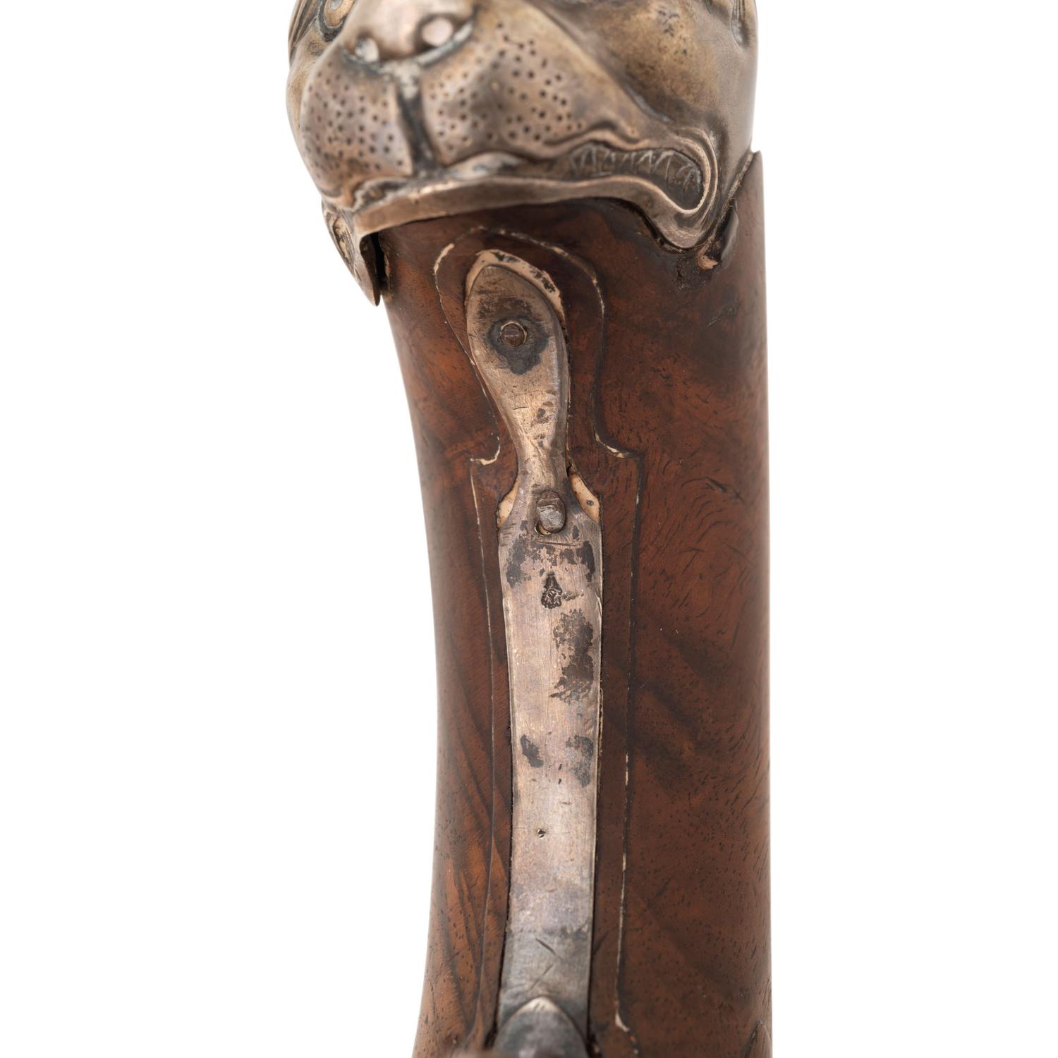 A Pair of Silver Mounted French Percussion Pistols