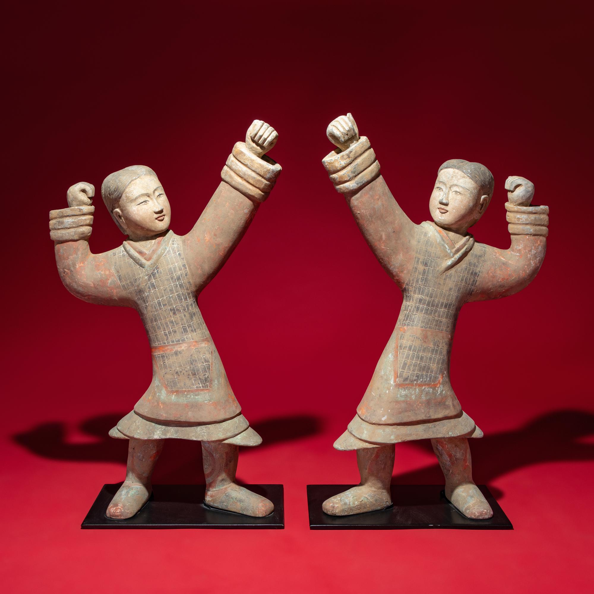 A Large Pair of Chinese Painted Pottery Archers, Western Han Dynasty — 西漢 彩繪射姿立俑一對