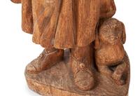 A Pair of Continental Carved Pine Figures