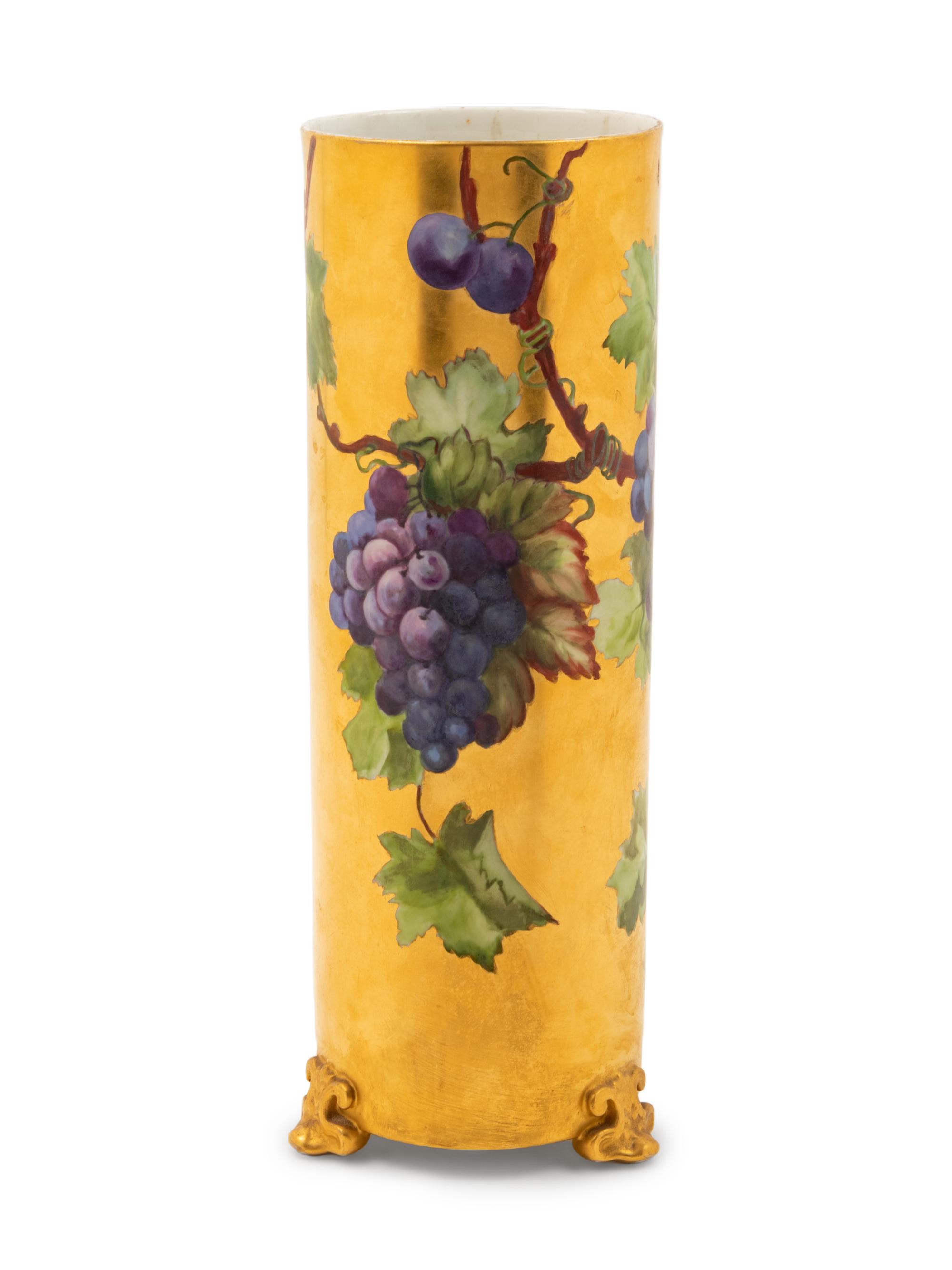 A Continental Parcel Gilt and Polychrome Porcelain Vase