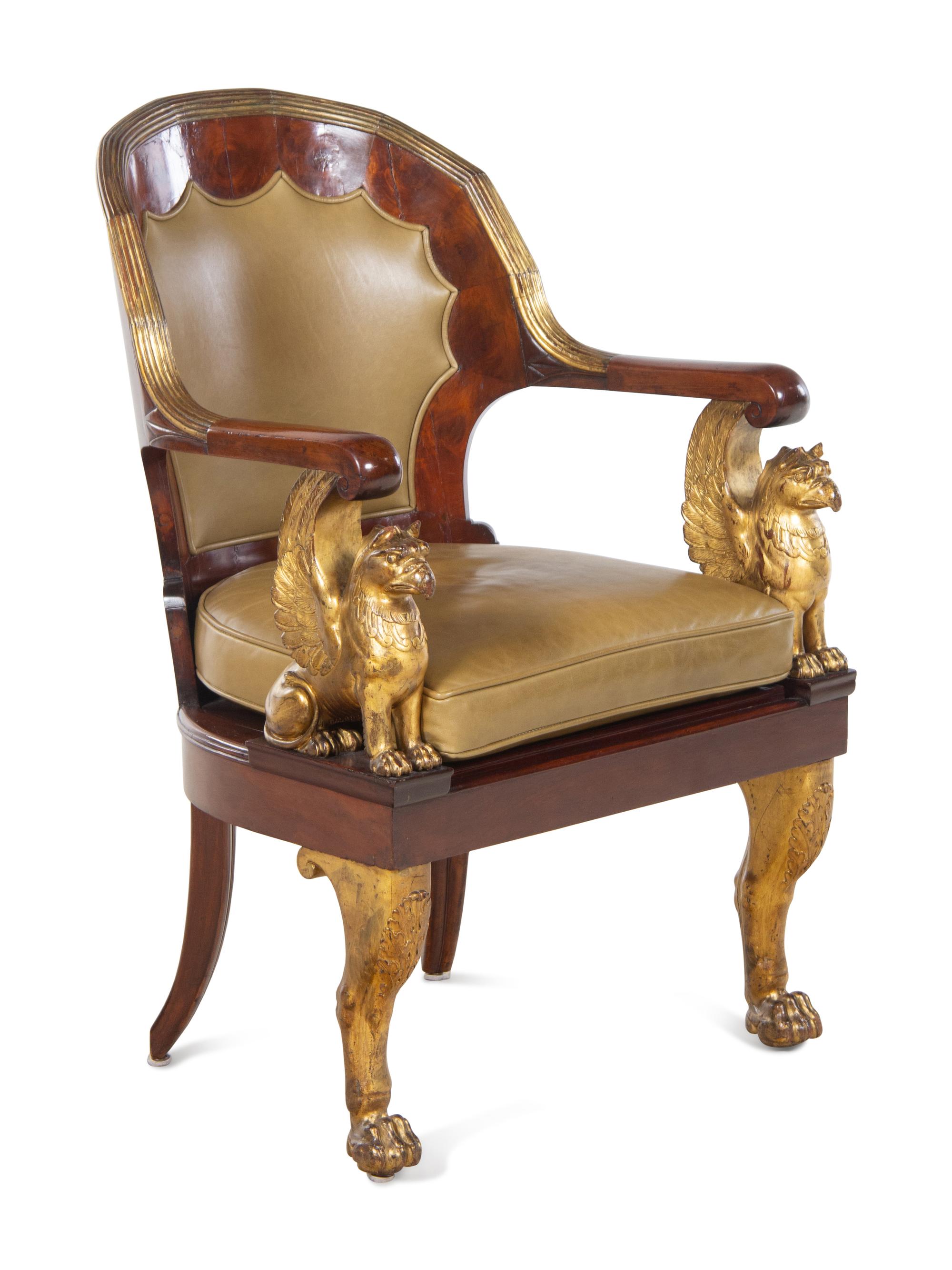 An Empire Parcel Gilt Mahogany Fauteuil