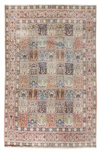 A Bakhtiari Wool Garden Rug 12 feet 4 inches x 9 feet 2 inches.