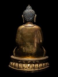 A Large Tibetan Gilt Bronze Figure of Seated Buddha