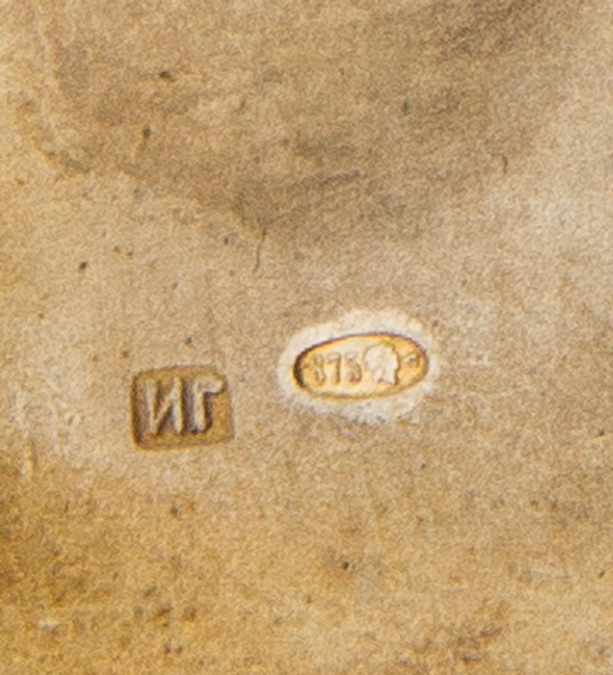 A Russian Silver Cigarette Case, Mark of Ivan Gubkin, Moscow, 20th Century, the case decorated with diagonal reeding, the lid with appl
