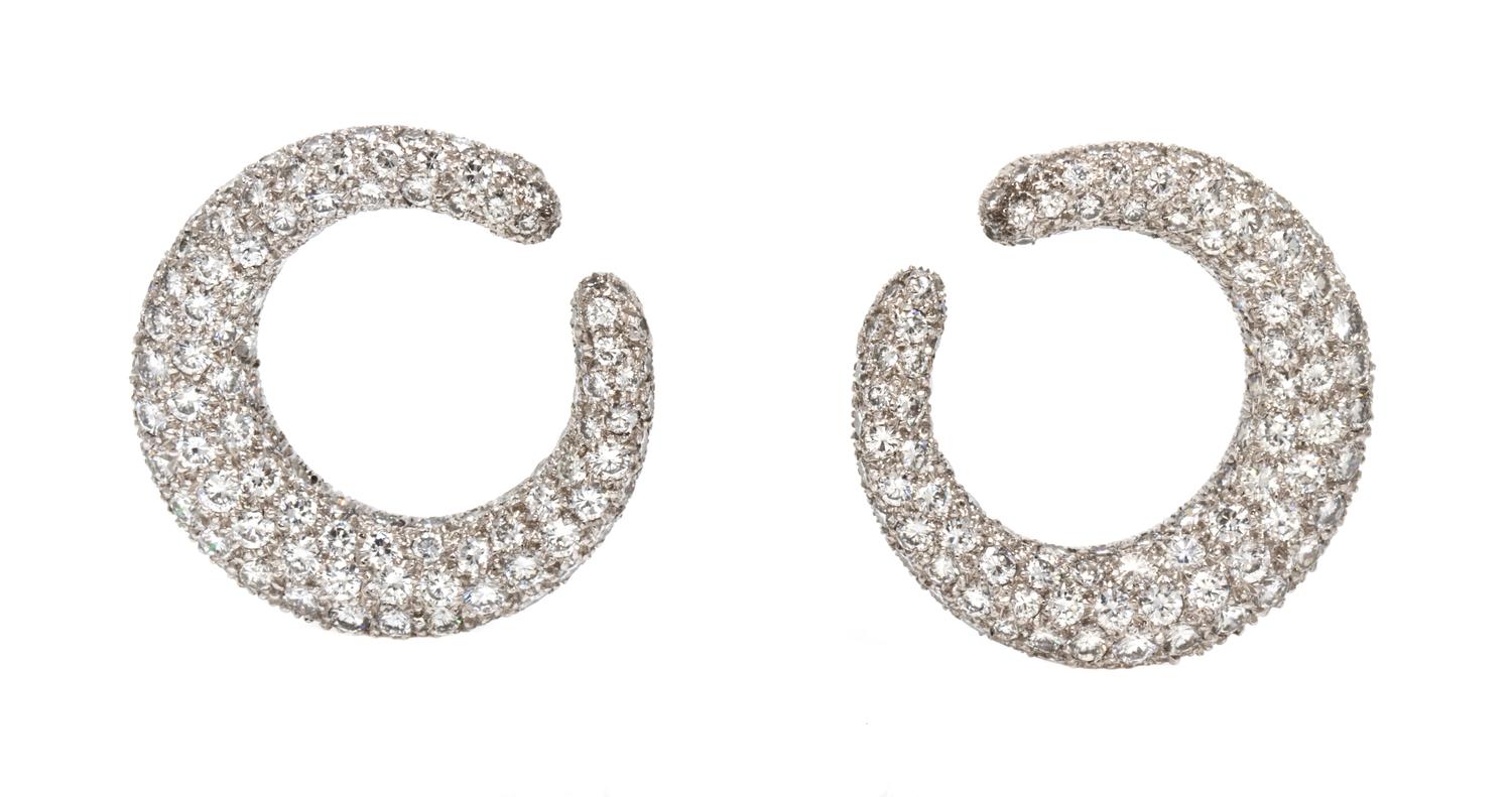 A Pair of Platinum and Diamond Hoop Earclips, Cartier, 11.10 dwts.
