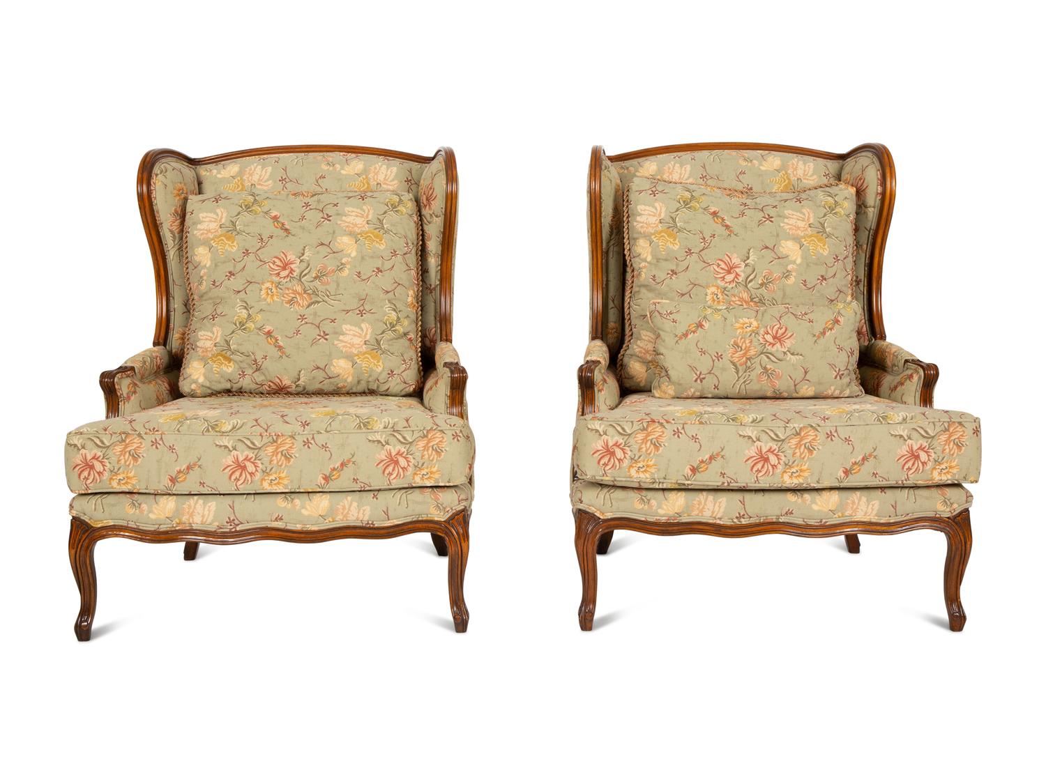 A Pair of Louis XV Style Fruitwood Bergères à Oreilles