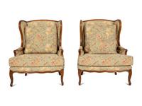 A Pair of Louis XV Style Fruitwood Bergères à Oreilles