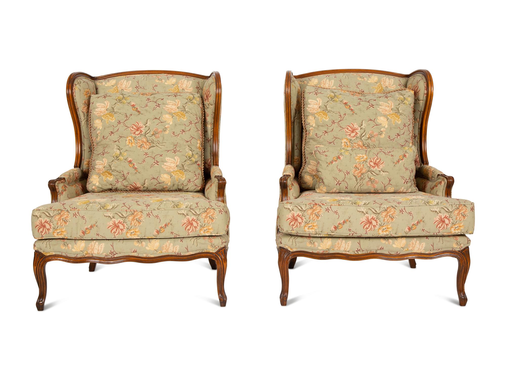 A Pair of Louis XV Style Fruitwood Bergères à Oreilles
