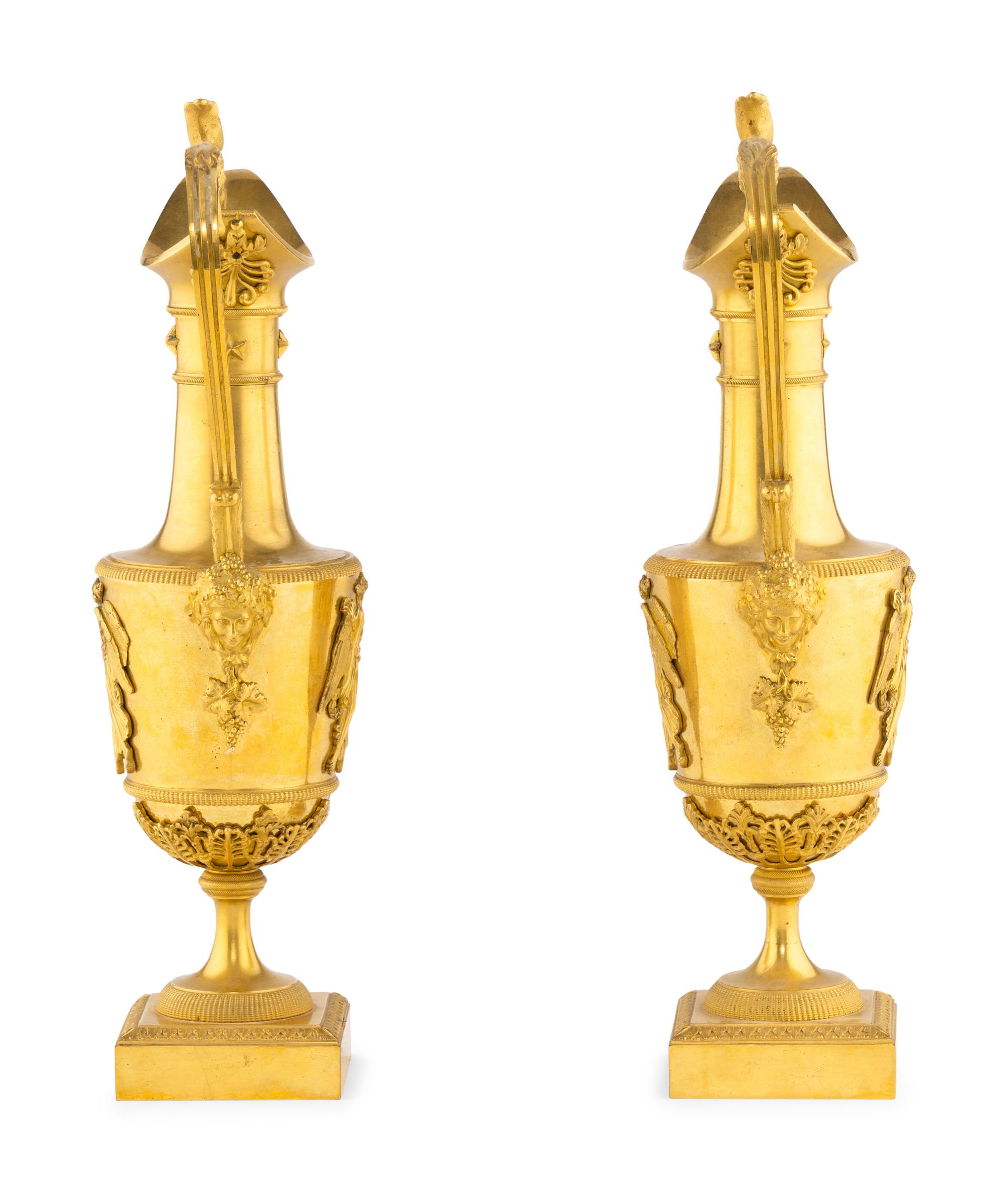 A Pair of Late Louis XVI Gilt Bronze Ewers