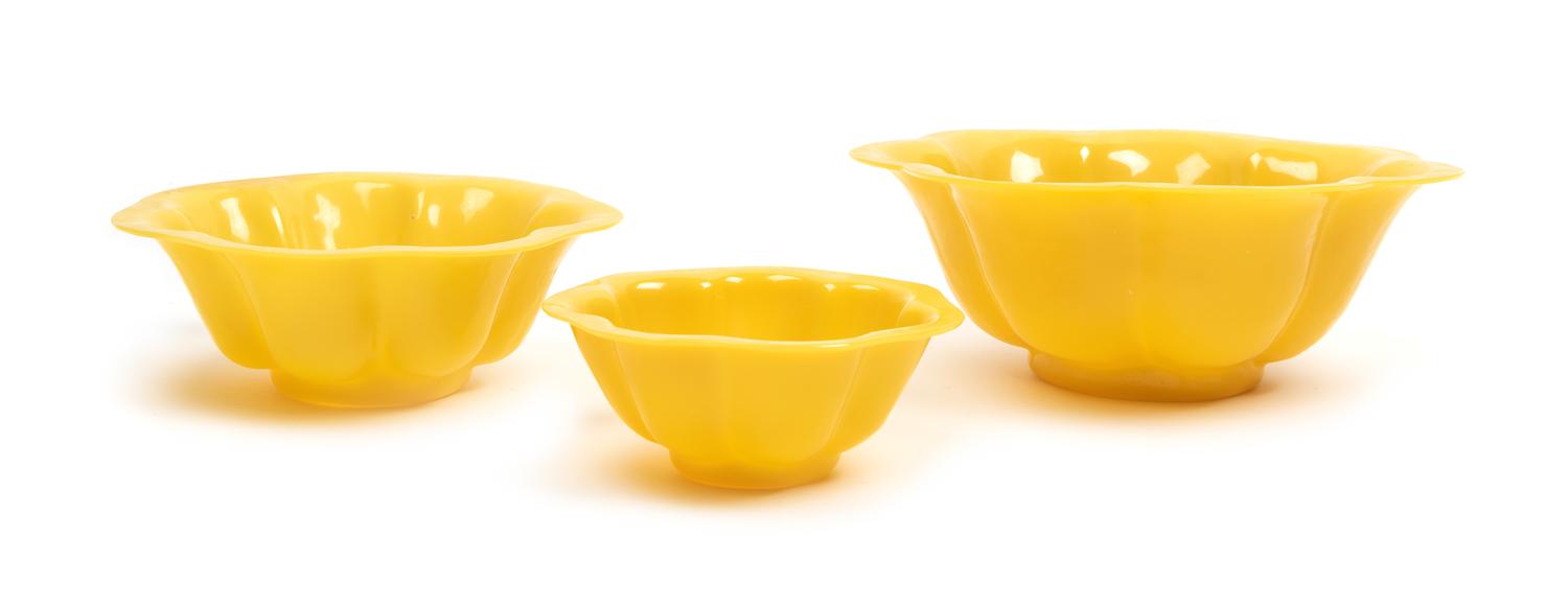 Three Chinese Yellow Peking Glass Bowls Diameter of largest 9 inches. — 19TH/20TH CENTURY