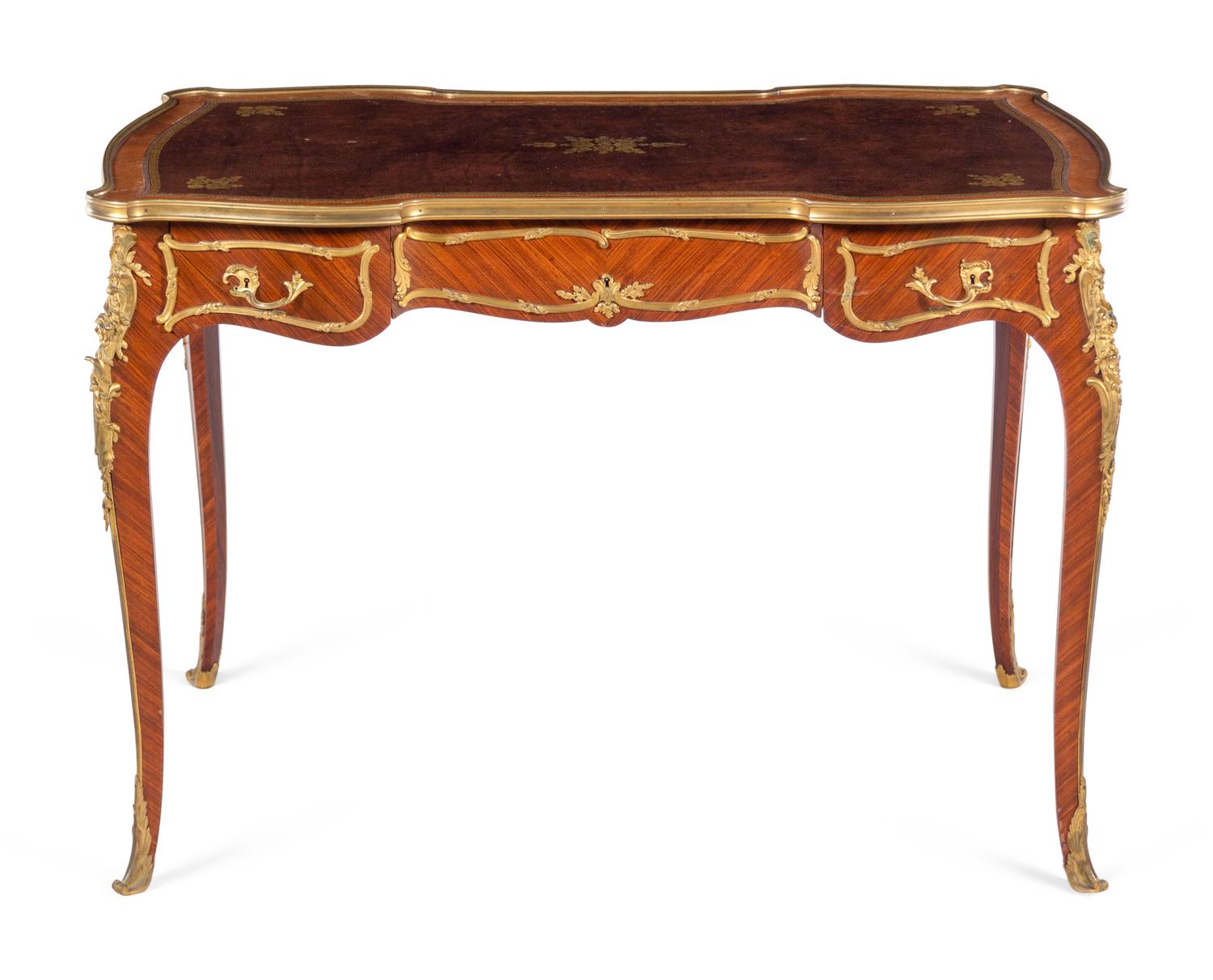 A Louis XV Style Gilt Bronze Mounted Kingwood Bureau Plat by François Linke