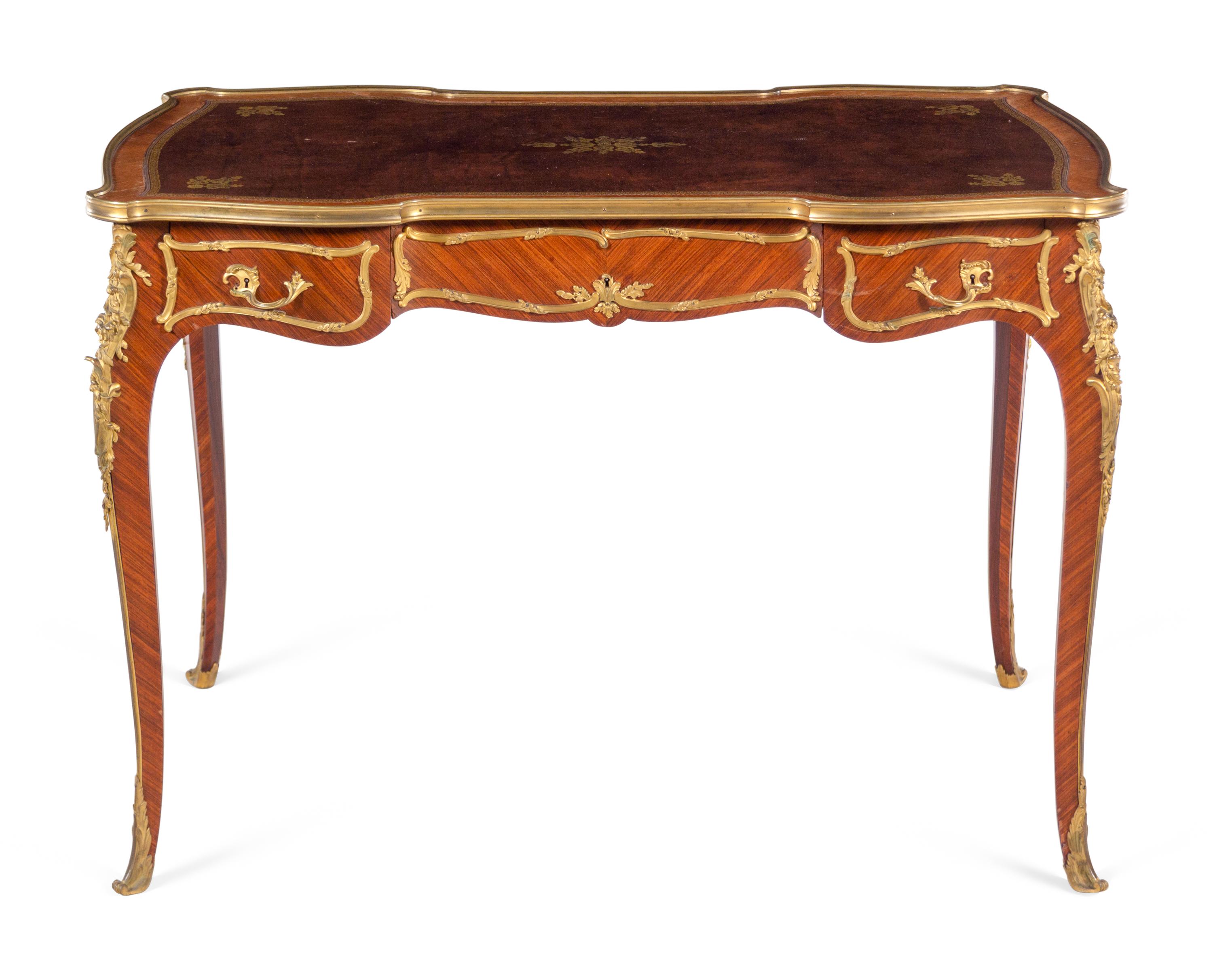A Louis XV Style Gilt Bronze Mounted Kingwood Bureau Plat by François Linke