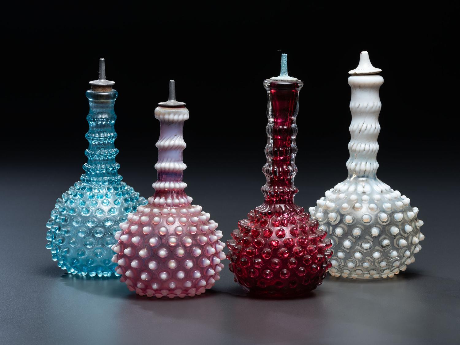 Four Hobnail Glass Barber Bottles