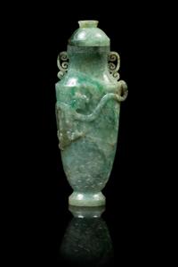 A Chinese Jadeite Covered Vase LATE 19TH/EARLY 20TH CENTURY Height 6 7/8 x width 2 3/4 inches (with cover). — LATE 19TH/EARLY 20TH CENTURY
